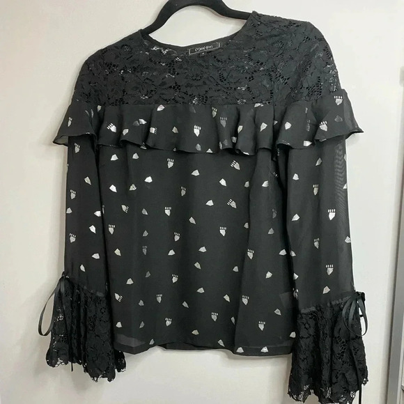 💚 Minkas - Black ruffle blouse with silver details - small - Picture 1 of 5